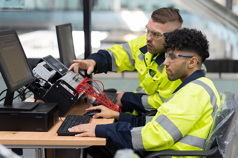 Two Man Working With Computer
